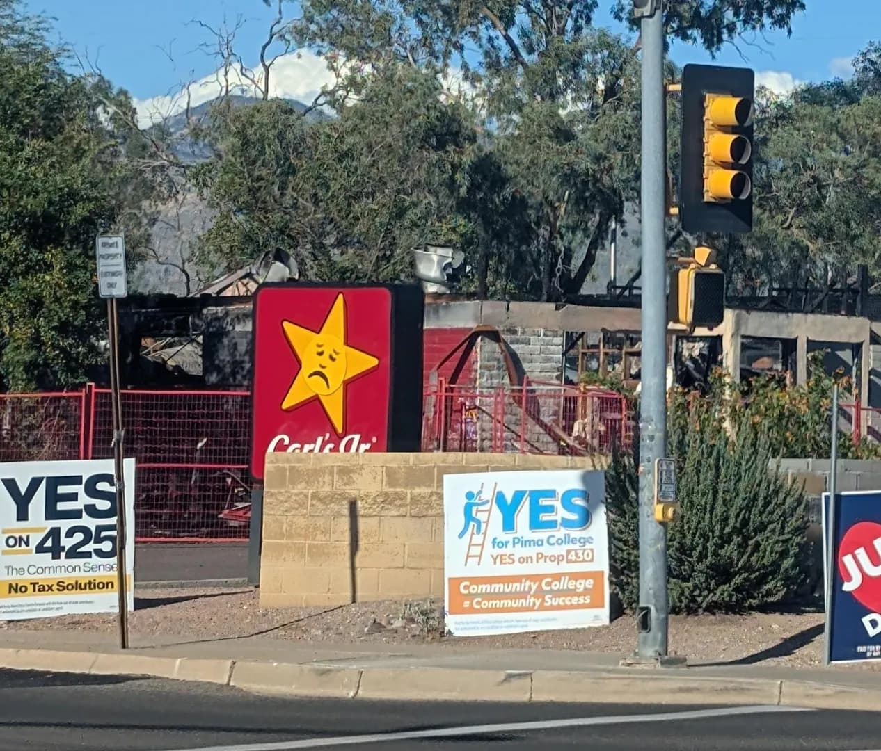 This sticker on a burned down Carl's Jr sign in my town