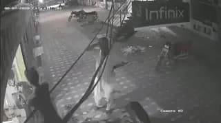 This man saves his friend from a deadly electrocution in Orangi town, Karachi, Pakistan