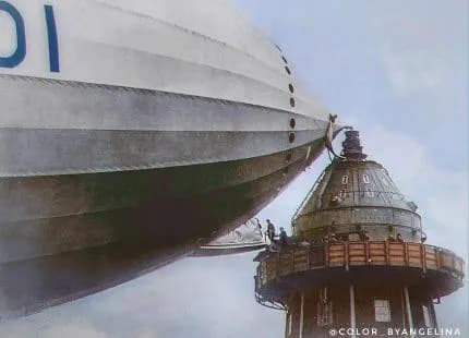 Passengers board an airship through a mooring mast attached to the nose, 1929 (a similar mast still exists on top of the Empire State Building)