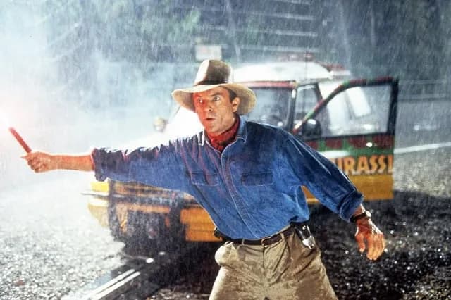 TIL that the iconic T. rex water ripple in Jurassic Park was made by a guitar string attached to the dashboard and plucked from beneath the car.