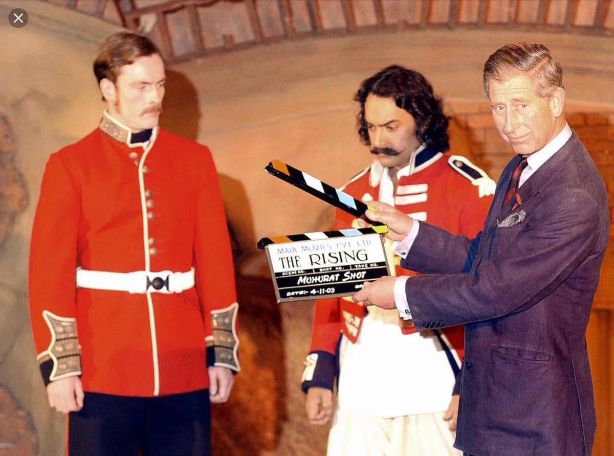 Prince Charles on the set of a Bollywood movie about rebellion against British colonial rule, 2003