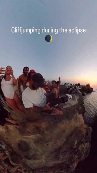 Cliff-Jumping during Solar Eclipse.