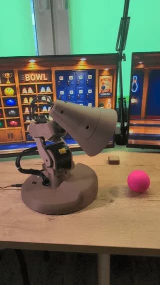 I built a robotic lamp and taught it to bowl