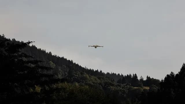 Canadair CL-415 collecting water from Lago di Molveno today.