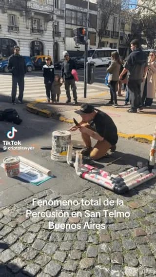 Street performer plays some of the coolest DIY drums I've ever listened to