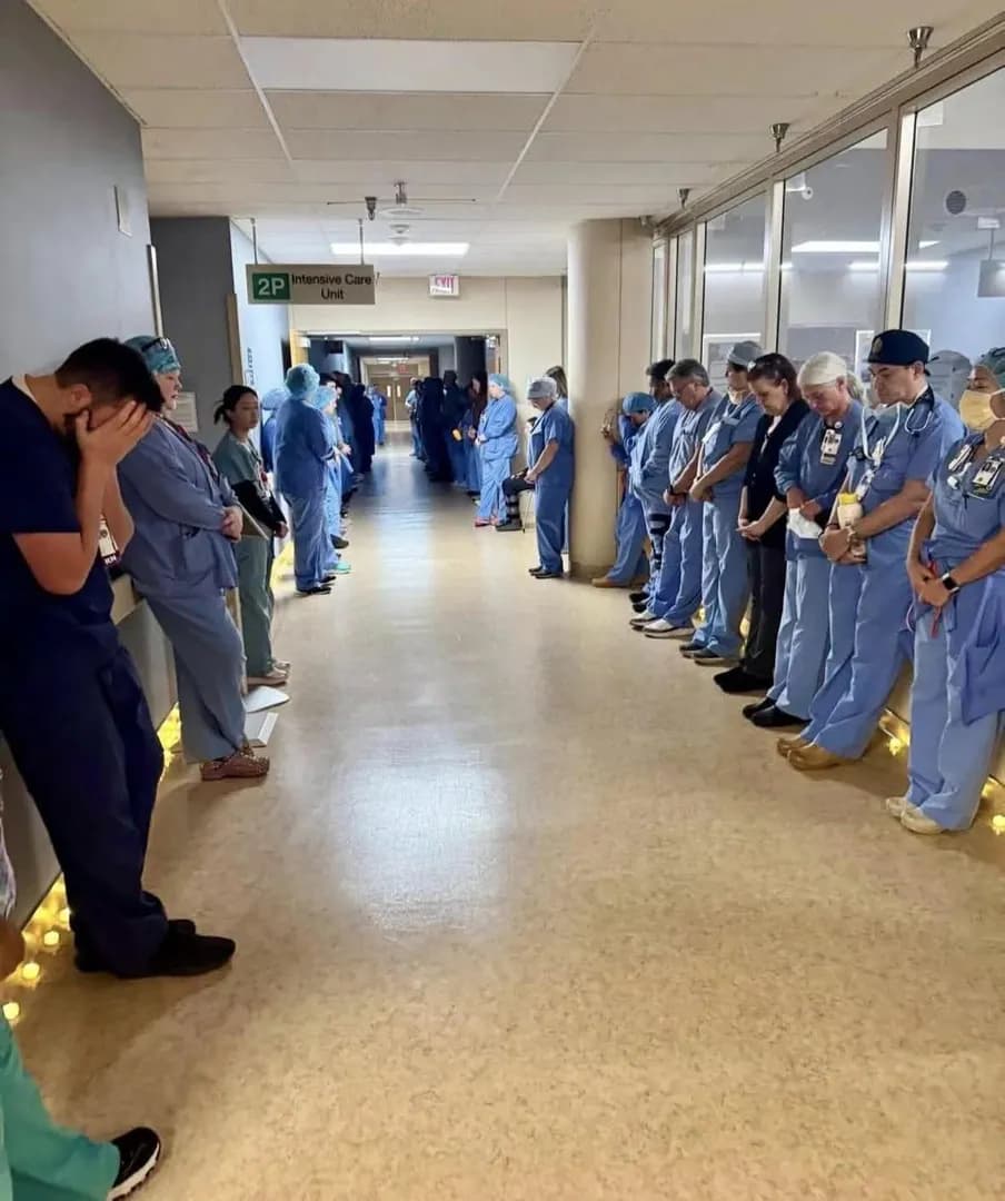 In January 2026, coworkers of ICU nurse Alex Pretti lined the hospital halls for a moment of silence after he was killed while protecting a woman.