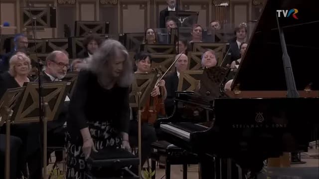 World class musician Martha Argerich plays Scarlatti’s Sonata in D Minor as an encore. At the age of 85 she is still performing in concert halls around the world.