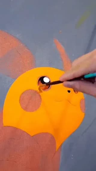 Painting Raichu with clean acrylic fill and sharp black outlines