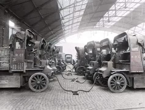 Electric trucks being charget at station St Pancras goods depot, London, England. 11 of July 1917.
