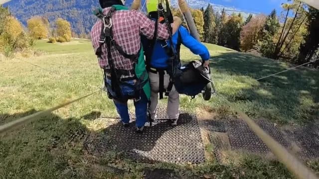 Tourist hangs on for his life, after pilot forgets to attach him to glider.