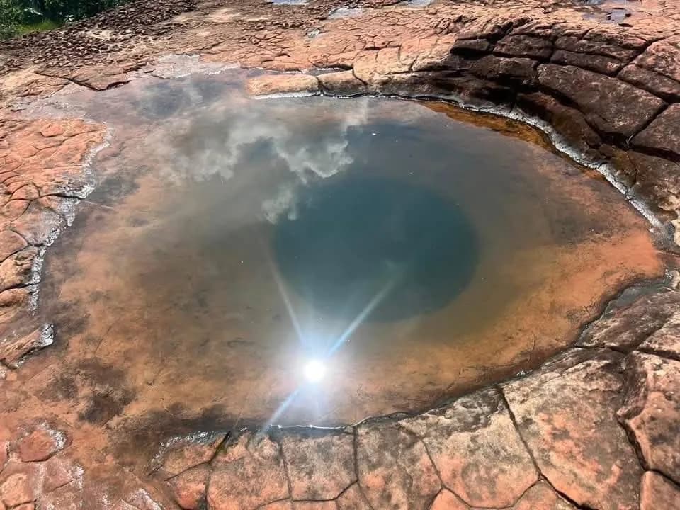 When It Rains at Thailand's Mystical Rock Formation its is called “Naga's Eye”