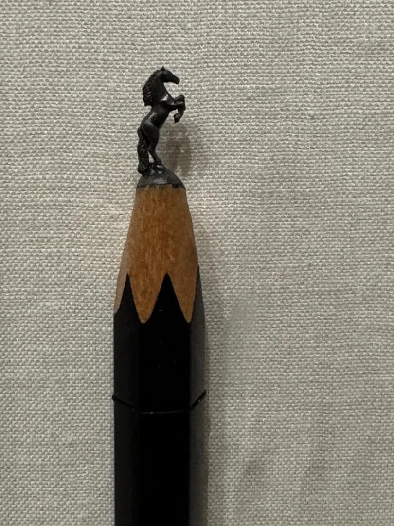 Stallion carved from pencil lead. The Mini Time Machine. Tucson, AZ.