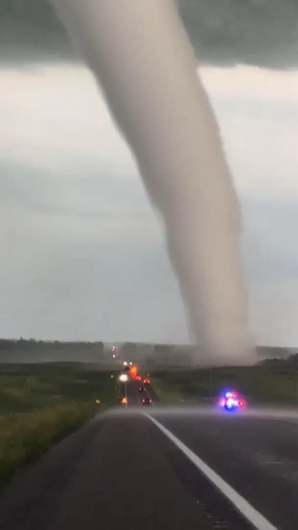 A nearly 3,000 foot tall EF3 crossing the road in South Dakota last season.