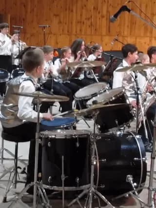 It was supposed to be just a school presentation, but a John Bonham came over the kid, and that was the result ๐