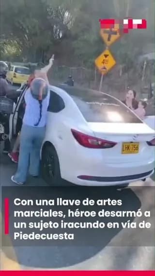 Biker takes down gunman using a lock.