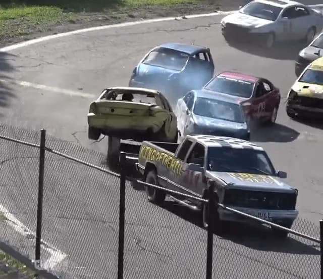The first car to park on the trailer wins