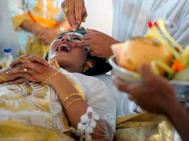 TIL that in Bali, teenagers have their canine teeth filed. In traditional Balinese belief, the practice removes the animal instincts of the person and proves that the person is mature enough to marry.