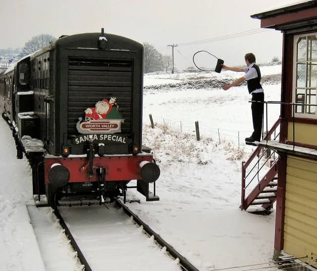 TIL that in some places trains must possess a metal token to travel on the line. The conductor will grab a loop with the new token and drop off the old token while the train is moving. A token can be