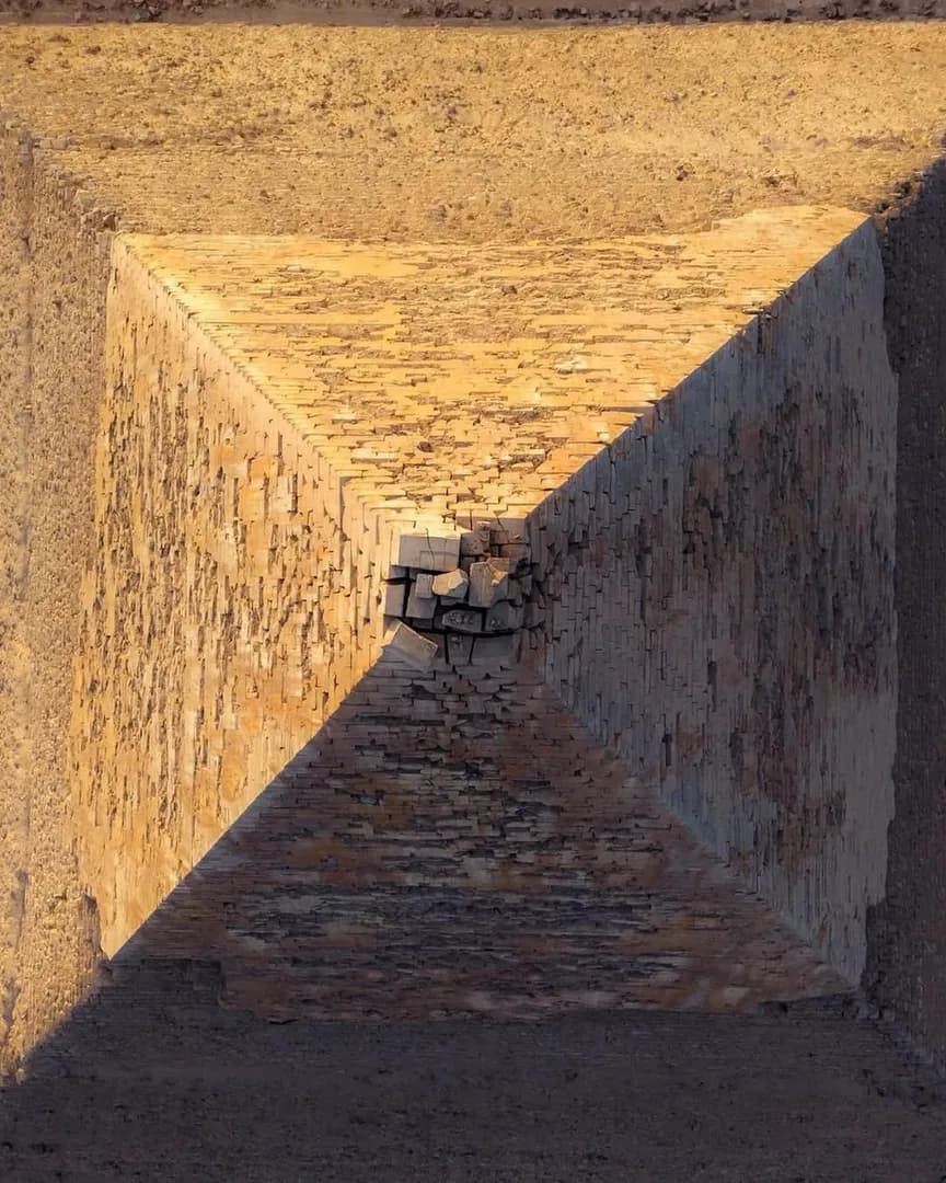 The Great Pyramid of Giza photographed from an angle that reveals its enormous stone blocks in extraordinary detail.